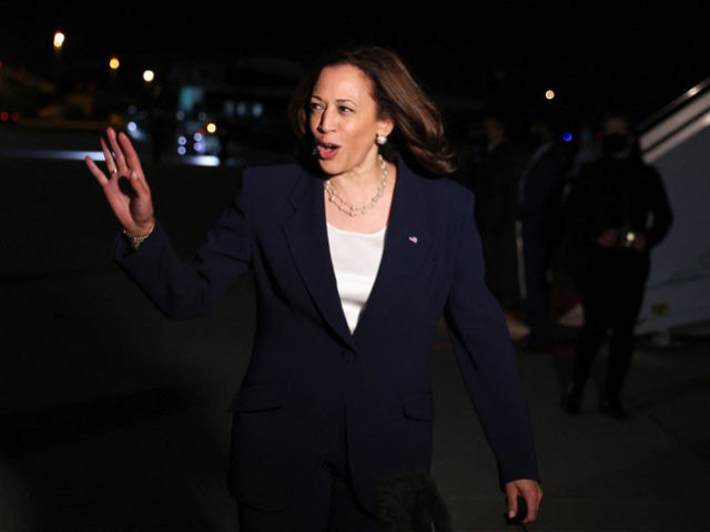 US Vice President Kamala Harris waves as she departs for travel to Southeast Asia, her first trip to this region as vice president to meet with government, private sector, and civil society leaders, at Joint Base Andrews in Maryland, August 20, 2021. (Photo by EVELYN HOCKSTEIN / POOL / AFP) …