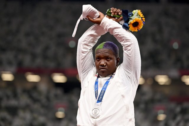 US shot putter Raven Saunders gestures on the podium with her silver medal