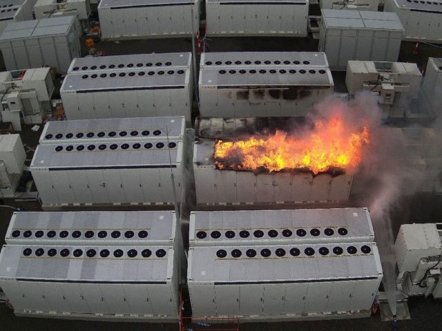This handout picture taken on July 30, 2021 and released on August 2 by Fire Rescue Victoria shows a fire from a 13-tonne lithium battery unit at a Tesla battery site in Australia