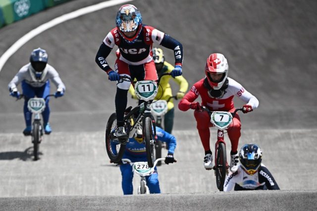 US BMX racer Connor Fields (centre) competes at the Tokyo Olympics