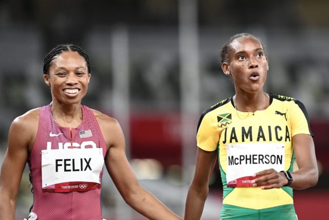 USA's Allyson Felix (L) is safely into the women's 400m final