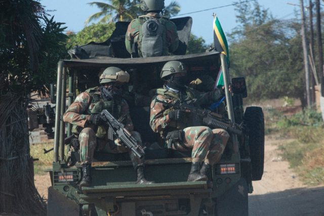 A convoy of South Africa National Defence Forces patrols the Maringanha district in Pemba