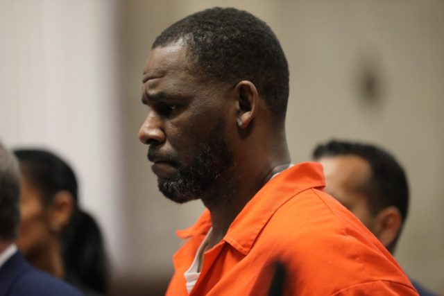 R. Kelly, shown here at a Chicago courthouse in 2019, faces four separate prosecutions in