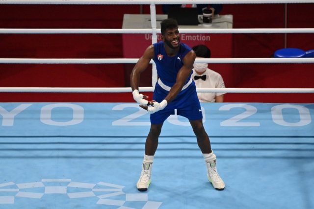 Cuba's Andy Cruz shows some dance moves after winning gold