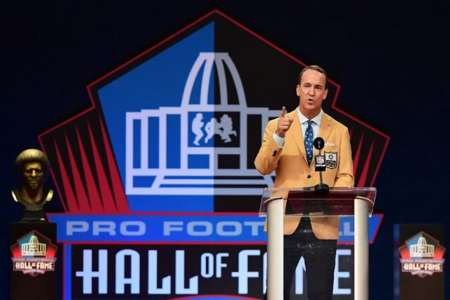 Peyton Manning speaks during the NFL Hall of Fame Enshrinement Ceremony at Tom Benson Hall