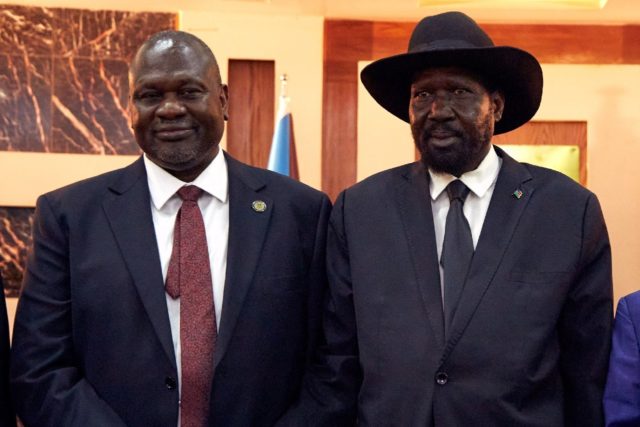 Machar, left, with President Salva Kiir at a swearing-in ceremony in Juba in February 2020