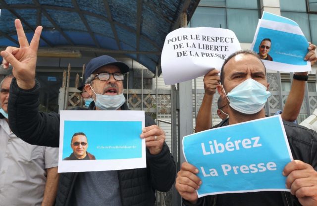 A demonstration outside the newspaper Liberte in Algiers on April 25, 2021 calling for the