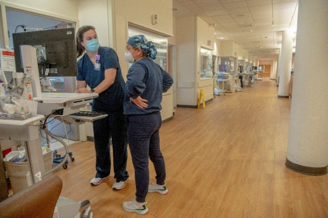 Nurses are seen at the intensive care unit at North Oaks hospital in Hammond, Louisiana, i
