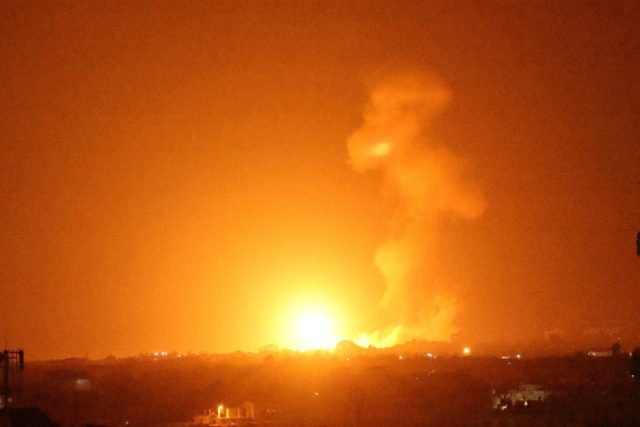 A fireball rises following an Israeli air strike in Khan Yunis in the southern Gaza Strip