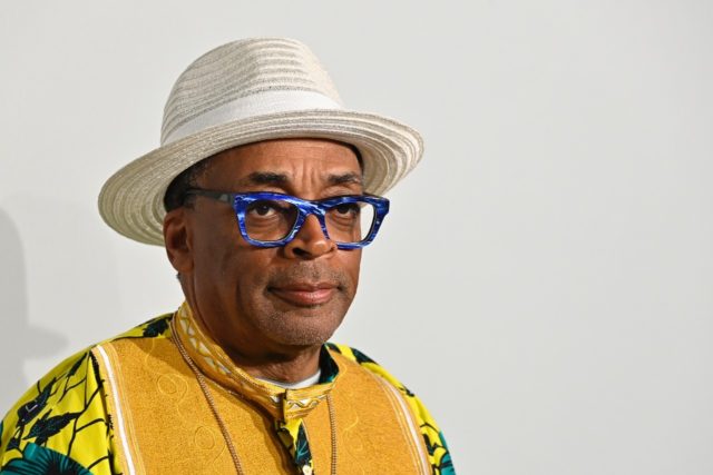 US director Spike Lee is facing criticism for including conspiracy theorists in his HBO do