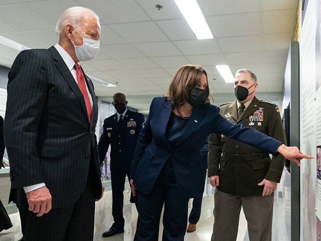 President Joe Biden and Vice President Kamala Harris, joined by Secretary of Defense Lloyd Austin and Chairman of the Joint Chiefs of Staff Gen. Mark Milley, tour the African Americans in service corridor Wednesday, Feb. 10. 2021, at the Pentagon in Arlington, Virginia. (Official White House Photo by Adam Schultz)