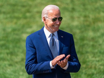 President Joe Biden claps during a clean car event Thursday, August 5, 2021 on the South Lawn of the White House. (Official White House Photo by Cameron Smith)