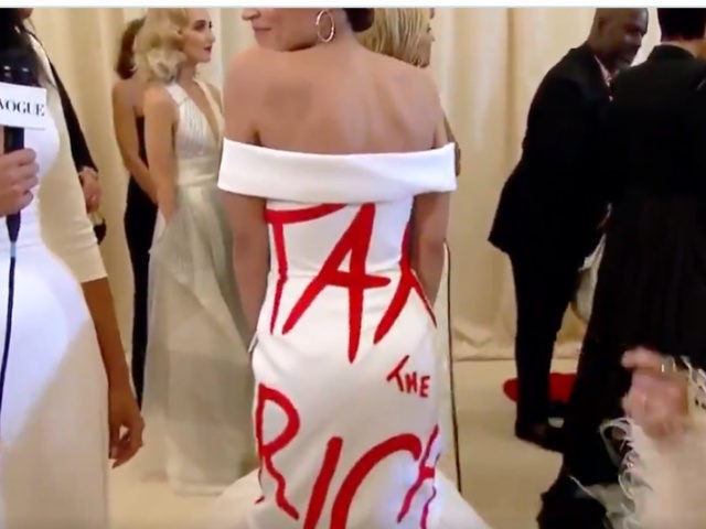 AOC Wears Designer Gown to Met Gala with the Words Tax the Rich