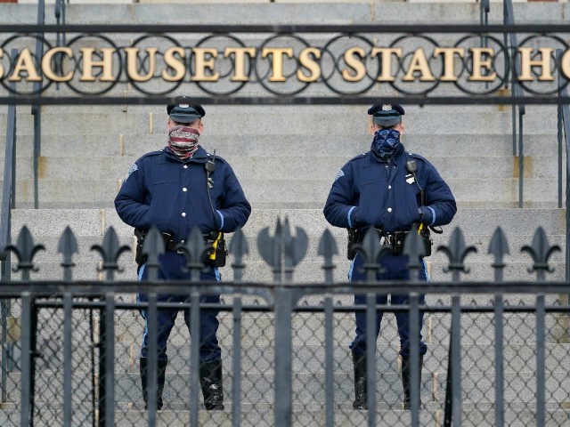 Massachusetts state troopers guard the front of the Statehouse, Wednesday, Jan. 20, 2021,