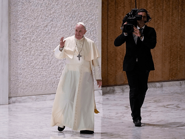 Pope Francis arrives for his weekly general audience at the Vatican, Wednesday, Aug. 25, 2
