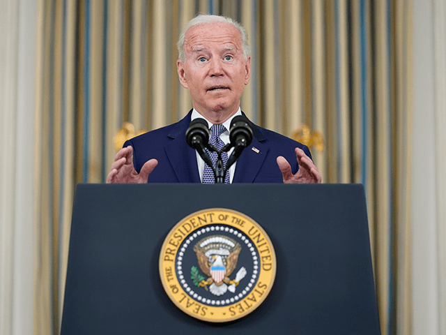 President Joe Biden speaks from the State Dining Room of the White House in Washington, Fr