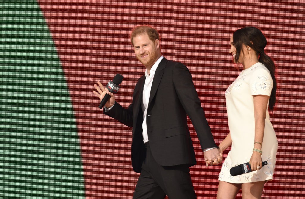 Prince Harry, the Duke of Sussex, left, and Meghan, the Duchess of Sussex appear at Global Citizen Live in Central Park on Saturday, Sept. 25, 2021, in New York. (Photo by Evan Agostini/Invision/AP)