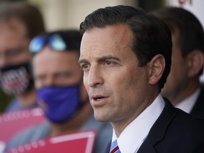 Former Nevada Attorney General Adam Laxalt, co-chair of the Donald Trump Nevada campaign, speaks at a news conference Tuesday, Nov. 17, 2020, in Las Vegas. (AP Photo/John Locher)