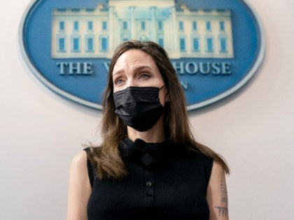 Actress and activist Angelina Jolie speaks with reporters in the Briefing Room before a me
