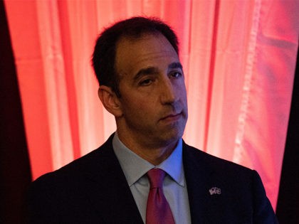 Jeff Bartos, who ran for Lieutenant Governor, watches on as Scott Wagner gives his concession speech at the Wyndham Garden York hotel on Tuesday, Nov. 6, 2018. Wagner lost to Democratic incumbent Tom Wolf. During his concession speech, Wagner said he's not going anywhere. Ydr Tl 110618 Wagnerelectionnight