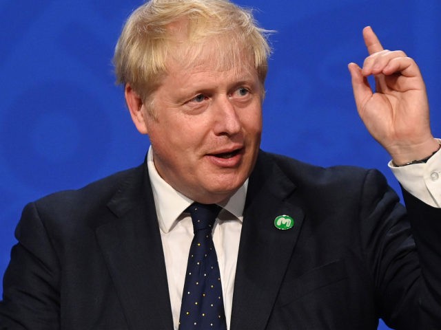 LONDON, UNITED KINGDOM - SEPTEMBER 7: Britain's Prime Minister Boris Johnson speaks during a news conference in Downing Street on September 7, 2021 in London, England. British Prime Minister Boris Johnson has outlined plans to raise taxes to pay for reforms to the social care system and the recovery of …