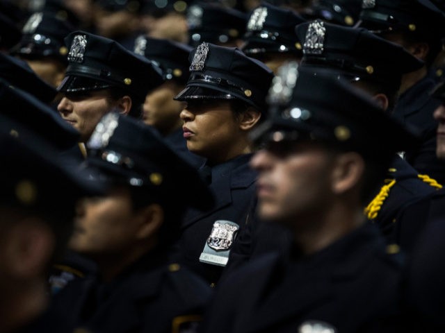 NEW YORK, NY - JULY 02: New York City Police Academy cadets attend their graduation ceremo