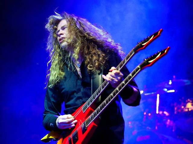 Singer and guitarist Dave Mustaine of the American trash metal band Megadeth performs during their concert in the Budapest Sports Arena in Budapest, Hungary, late Friday, April 8, 2011. (AP Photo/MTI, Balazs Mohai)