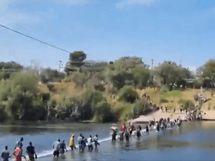 Thousands of mostly Haitian migrants stream across the Rio Grande into Texas. (Video Screenshot/U.S. Rep Chip Roy)
