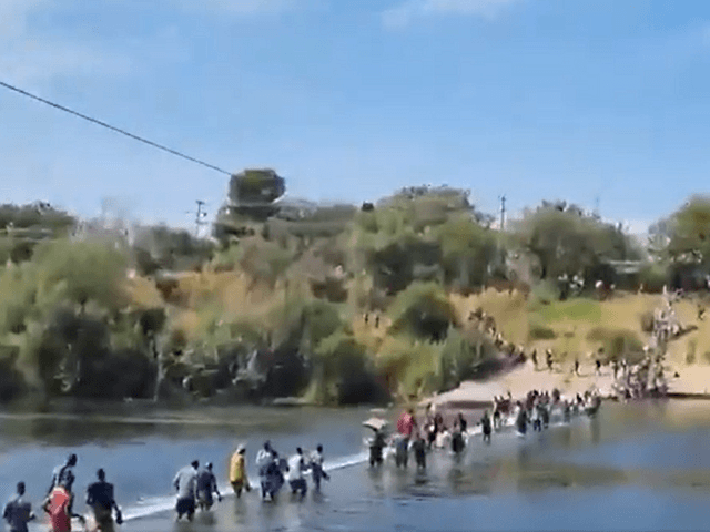 Thousands of mostly Haitian migrants stream across the Rio Grande into Texas. (Video Scree