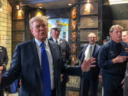 Former President Donald Trump visits the Engine Co. 8 firehouse where he praised first responders' bravery while criticizing President Joe Biden over the pullout from Afghanistan, Saturday Sept. 11, 2021, in New York. (AP Photo/Jill Colvin)