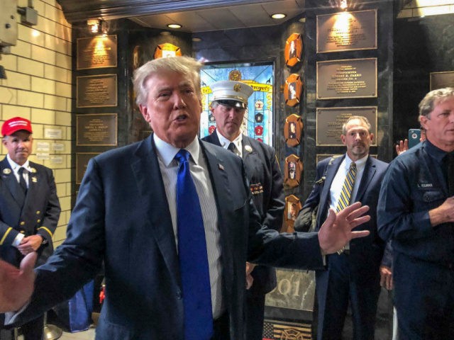 Former President Donald Trump visits the Engine Co. 8 firehouse where he praised first responders' bravery while criticizing President Joe Biden over the pullout from Afghanistan, Saturday Sept. 11, 2021, in New York. (AP Photo/Jill Colvin)