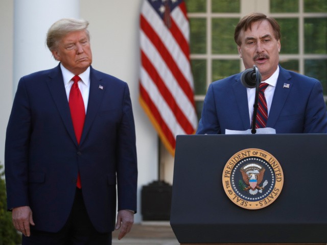 In this March 30, 2020 file photo, My Pillow CEO Mike Lindell speaks as President Donald Trump listens during a briefing about the coronavirus in the Rose Garden of the White House, in Washington. Lindell, an avid supporter of President Donald Trump, who has continued to push the notion of election fraud since Trump lost to Joe Biden in the presidential election in November, said his products will no longer be carried in the stores of some retailers, including Bed Bath & Beyond and Kohl's. (AP Photo/Alex Brandon, File)