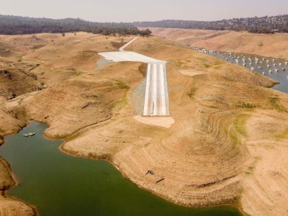 A marooned boat launch ramp rests along a depleted Lake Oroville in Oroville, California on September 5, 2021. - Lake Oroville is currently at 23% of its capacity and is suffering from extreme levels of drought. Much of California in the western US is currently gripped by excessive heat, severe …