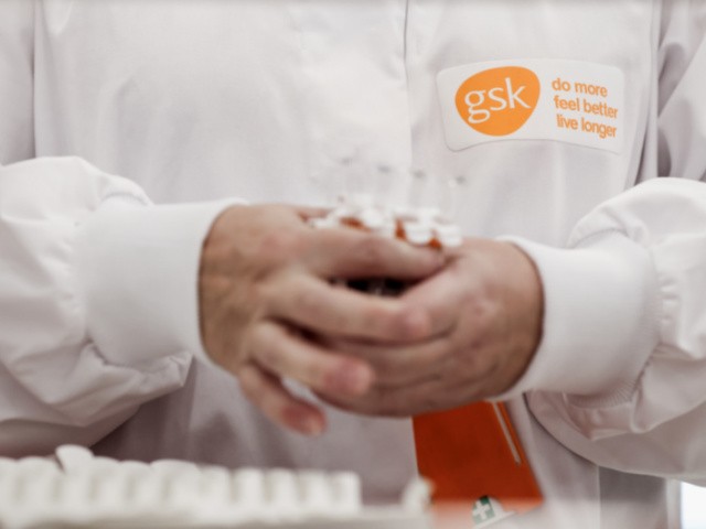 A GSK employee is at work at the factory of British pharmaceutical company GlaxoSmithKline (GSK) in Wavre on February 8, 2021 where the Covid-19 CureVac vaccine will be produced. - British pharmaceutical group GlaxoSmithKline (GSK) and German biotech firm CureVac announced plans to jointly develop a coronavirus vaccine with the potential to counter multi-variants of Covid-19. (Photo by Kenzo TRIBOUILLARD / AFP) (Photo by KENZO TRIBOUILLARD/AFP via Getty Images)