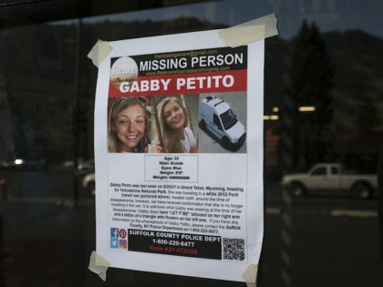This September 16, 2021, photo, shows a Suffolk County Police Department missing person poster for Gabby Petito posted in Jakson, Wyoming. (AP Photo/Amber Baesler)