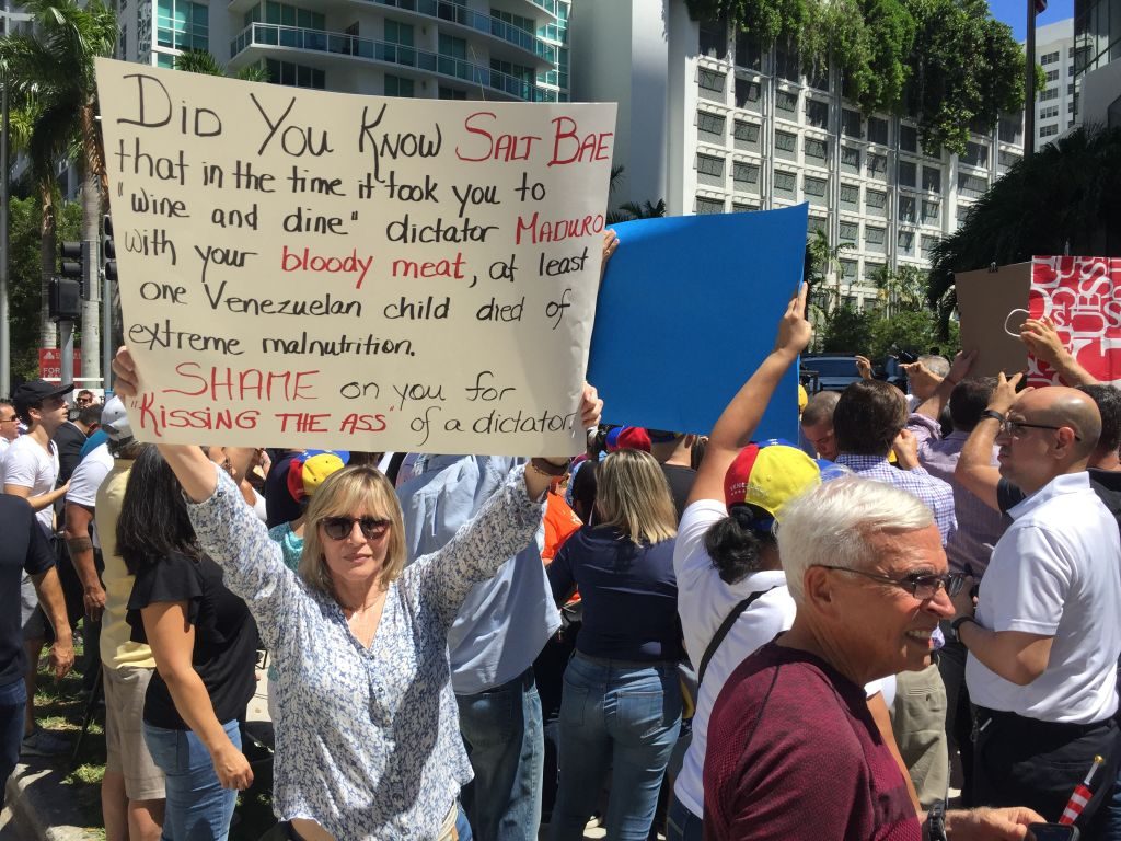 Venezuelans protest in front of the Nusr-Et Steakhouse restaurant in Brickell, near Downtown Miami, on September 19, 2018. - Nusr-Et' Turkish chef Nusret Gökçe, known as "Salt Bae", made waves in the news after he hugged and lavished Venezuelan president Nicolas Maduro in one of his restaurants in Istanbul. (Photo by Leila MACOR / AFP) (Photo credit should read LEILA MACOR/AFP via Getty Images)