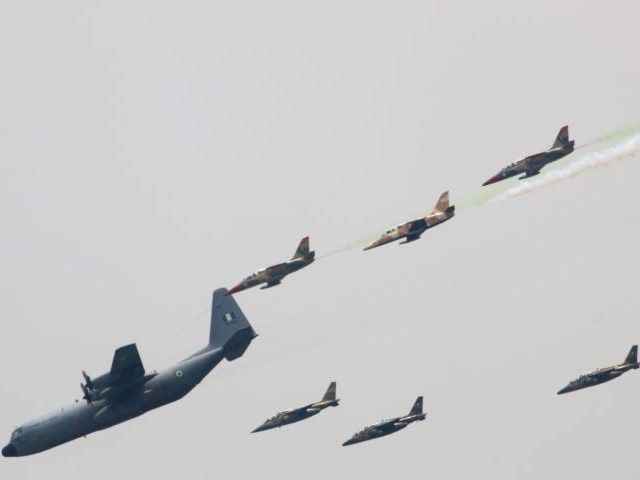 Nigerian Air Force planes perfom during a military parade marking the country's 58th anniv