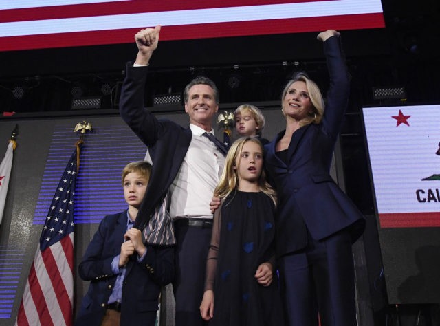 LOS ANGELES, CA - NOVEMBER 06: Democratic gubernatorial candidate Gavin Newsom holding his