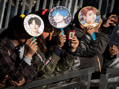 Fans wait for K-Pop group BTS to take the stage in Central Park, May 15, 2019 in New York City. Fans waited in line for days to see the group perform as part of ABC's 'Good Morning America' summer concert series. (Photo by Drew Angerer/Getty Images)
