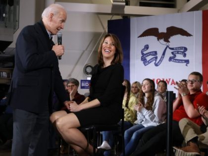 ANKENY, IOWA - JANUARY 25: Democratic presidential candidate former Vice President Joe Biden (L) is joined by Rep. Cindy Axne (D-IA) during a town hall meeting inside the John Deere Exhibition Hall at the FFA Enrichment Center January 25, 2020 in Ankeny, Iowa. While three of the top-polling Democratic presidential …
