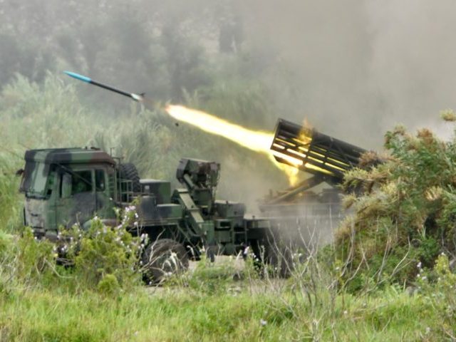 A projectile is launched from a Taiwanese-made Thunderbolt-2000 multiple rocket system during the annual Han Kuang military drills in Taichung on July 16, 2020. - The five-day "Han Kuang" (Han Glory) military drills starting on July 14 aimed to test how the armed forces would repel an invasion from China, …
