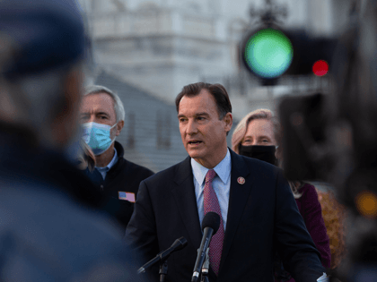 Rep. Tom Suozzi (D-NY) speaks at the podium standing with members of the Problem Solvers Caucus to praise the forthcoming passage of the bipartisan emergency COVID-19 relief bill in a press conference outside the US Capitol on December 21, 2020 in Washington, DC. The bipartisan group took credit for leading …
