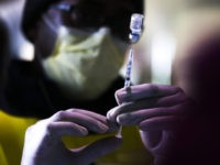 Exiting FDA Regulators Say Pushing Booster Shots Undermines Coronavirus Vaccines