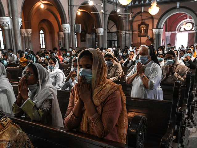 Christians devotees attend an Easter mass at the Sacred Heart Cathedral in Lahore on April 4, 2021.  (Photo by Arif ALI / AFP) (Photo by ARIF ALI/AFP via Getty Images)