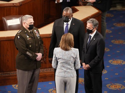 WASHINGTON, DC - APRIL 28: U.S. Speaker Nancy Pelosi (D-CA) talks with (L-R) Chairman Mark Milley of the Joint Chiefs of Staff, Defense Secretary Lloyd Austin and Secretary of State Antony Blinken after President Joe Biden addressed a joint session of Congress in the House chamber of the U.S. Capitol …