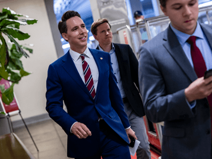 U.S. Sen. Josh Hawley (R-MO) walks through the basement of the U.S. Capitol Building on August 10, 2021 in Washington, DC. The Senate voted 69-30 to pass the $1 trillion infrastructure bill today before moving on to budgetary resolutions. (Photo by Samuel Corum/Getty Images)