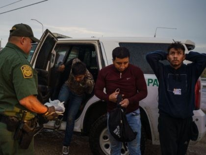 Migrants are processed by United States Border Patrol after being caught trying to enter the United States undetected in Sunland Park, New Mexico on September 1, 2021. (Photo by PAUL RATJE / AFP) (Photo by PAUL RATJE/AFP via Getty Images)