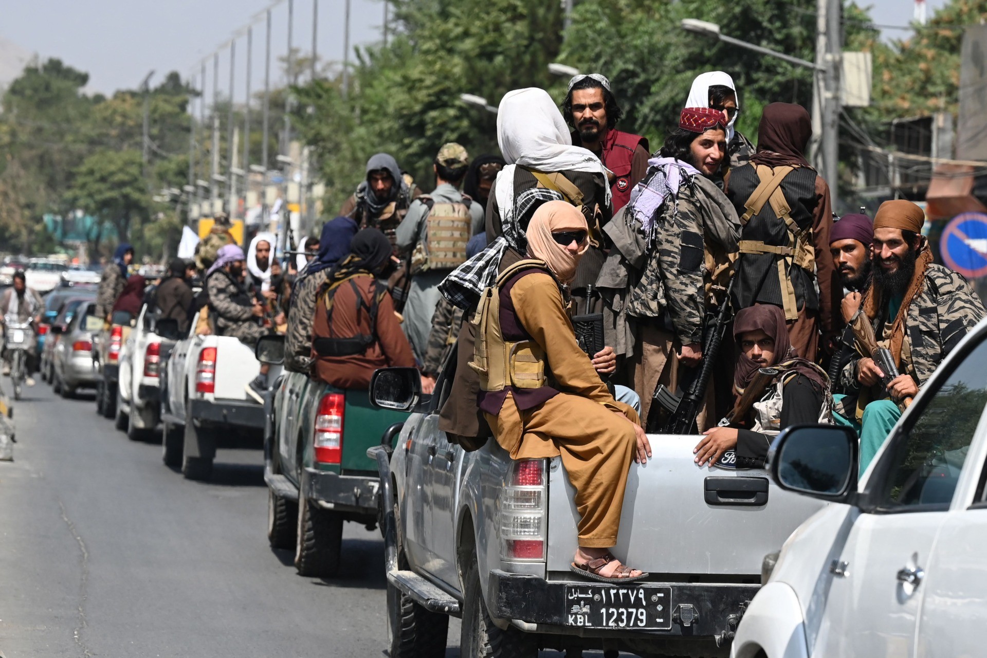 A convoy of Taliban fighters patrol along a street in Kabul on September 2, 2021. (Photo by Aamir QURESHI / AFP) (Photo by AAMIR QURESHI/AFP via Getty Images)