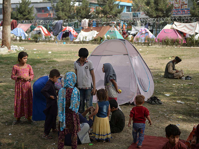 Internally displaced children gather near their makeshift campsite during a free medical camp at Shahr-e-Naw Park in Kabul on september 11, 2021. (Photo by Hoshang Hashimi / AFP) (Photo by HOSHANG HASHIMI/AFP via Getty Images)