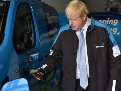 LEICESTER, ENGLAND - SEPTEMBER 13: Britain's Prime Minister Boris Johnson charges an electric van during a visit to a British Gas training academy on September 13, 2021 in Leicester, England. (Photo by Rui Vieira - WPA Pool/Getty Images)